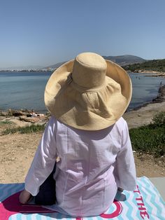 "Natural beige palm straw hat called the 'Poppadom!' A flexible wide brim hat you can switch into any shape - so it's lots of fun and can be styled for any occasion. Easy to wear, not hot and easy shape to your liking. Soft, natural material made from palm straw. Returns back to it's original shape. This hat is handmade, easy to wear, great for travel and a best seller! 🌀Flat top crown 🌀Flexible brim to adjust to your style 🌀Casual sun protection hat great for walking or gardening 🌀Lightweig Kentucky Derby Bucket Hat With Upf 50+, Kentucky Derby Upf 50+ Bucket Straw Hat, Brimmed Sun Hat With Uv Protection For Kentucky Derby, Brimmed Hat With Upf 50+ For Sunbathing, Curved Brim Panama Hat For Sunbathing With Upf 50+, Curved Brim Sun Hat With Upf 50+ For Sunbathing, Curved Brim Uv Protection Sun Hat For Kentucky Derby, Upf 50+ Brimmed Straw Hat For Garden Party, Kentucky Derby Wide Brim Sun Hat With Uv Protection