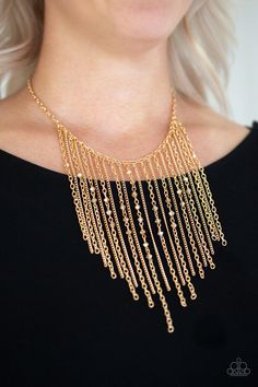 Varying in length, mismatched gold chains stream from the bottom of a classic gold chain. Faceted golden crystal-like beads sporadically dot the free-falling chains, creating a statement-making fringe below the collar. Features an adjustable clasp closure. Sold as one individual necklace. Includes one pair of matching earrings. Gold Fringe Necklace, Trendy Fringe, Golden Crystal, Hematite Crystal, Gold Fringe, 25 21, Free Falling, Silver Chains, Fringe Necklace