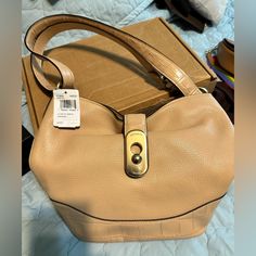 New Never Used Coach Bag. Beige Bucket Shoulder Bag With Gold-tone Hardware, Bucket Satchel With Gold-tone Hardware For Shopping, Coach Bucket Bag With Gold-tone Hardware, Shopping Satchel With Gold-tone Hardware And Bucket Shape, Shopping Bucket Satchel With Gold-tone Hardware, Coach Travel Bucket Bag With Gold-tone Hardware, Everyday Coach Bucket Bag With Gold-tone Hardware, Chic Beige Coach Shoulder Bag, Gold-tone Hardware Bucket Shoulder Bag For Shopping