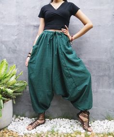 "The harem style trousers made from cotton fabric 100%with an elasticated smock waist and ankles they provide a comfortable lightweight fit, perfect for casual wear, festivals, yoga, holidays as well as pairing with a plain top to get that popular look. D I S C O U N T & P R O M O T I O N ❤ Buy 2 or more items, get 10% off ❤ Buy 4 or more items, get 15% off ENTER the coupon code: IYARA015 ❤ Buy 6 or more items, get 15% off ENTER the coupon code: IYARA020 PLEASE NOTE I can not apply a discoun Herum Pants, Boho Hippie Pants, Green Pants Men, Japanese Clothes, Bohemian Pants, Festival Pants, Balloon Pants, Hippie Clothes, Harem Pants Women