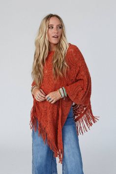 The Sea Beyond Lace Poncho - it’s a true showstopper! This poncho is a must-have and a compliment magnet because it features: * So pretty and unique, delicate, scalloped lace knit fabric * Relaxed and loose poncho silhouette (no sleeves) * So cute fringe details along the bottom edges for added boho style * Lightweight layering piece to elevate any of your boho outfits! Approximate measurements are as follows: ONE SIZE: Width: 66", Length: 36", Sleeve length: 22" Materials: 100% Acrylic * Hand wash cold, Lay flat to dry Lace Poncho, Cute Fringe, Boho Outfit, Boho Sweater, Poncho Cape, Scalloped Lace, On Repeat, Lace Knitting, Layering Pieces