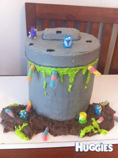 a birthday cake made to look like a garbage can