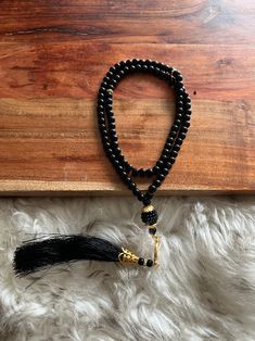 99 beads lightweight Tasbih with gold pendant and colored Tassle - with Gift Box Traditional Black Mala As A Gift, Gold Mala With 108 Beads As Gift, Traditional Black Beads For Meditation, Spiritual Gold Beads For Gifts, Traditional Gemstone Beads Rosary As Gift, Traditional Gold Beaded Rosary, Traditional Black Rosary As Gift, Islamic Gifts, Prayer Beads