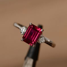 Multistone Ring, July Birthstone Ring, Classic Engagement Ring Solitaire, The Bling Ring, Ring Emerald Cut, Black Gold Jewelry, Pink Ruby, Ruby Engagement Ring, Ring Emerald