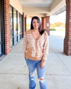 Striped print knit cardigan with solid contrast hems, long sleeves, and front pockets. Small: 2/4 Medium: 6/8 Large: 10/12 Casual Brown Cardigan For Day Out, Cream Sweater With Pockets For Fall, Sweater With Pockets For A Fall Day Out, Trendy Brown Cardigan For Day Out, Brown Sweater With Pockets For Spring, Brown Spring Cardigan For Everyday, Brown Long Sleeve Sweater For Day Out, Downtown Raleigh, Women's Boutique