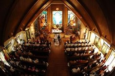 an overhead view of a church with people sitting in pews