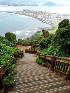 stairs lead down to the beach and ocean