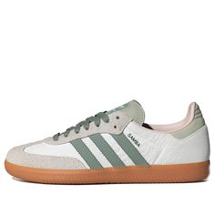 The adidas Samba OG Silver Green Putty Mauve is a classic sneaker inspired by the original 1950s indoor soccer shoe. Featuring a white leather upper with hairy suede detailing in beige, the shoe boasts iconic green stripes and a green heel tab. The rubber outsole provides traction, and the shoe is made with at least 20% recycled materials. Samba Shoes, Samba Outfit, Adidas Samba Og, Green Heels, Limited Edition Sneakers, Green Sneakers, Green Brands, Classic Sneakers, Adidas Samba