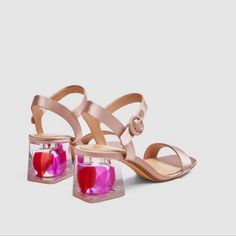 Dark Pink Satin Sandals. Feathers Inside The Clear Heels. Buckled Ankle Straps. Heel Height Of 5.5 Cm. / 2.1" Upper 95% Polyester, 5% Polyurethane Lining 100% Polyurethane Sole 60% Polyurethane Thermoplastic, 40% Polyurethane Slipsole 80% Goat Leather, 15% Polyester, 5% Polyurethane S54 Feminine Pink Round Toe Sandals, Blush Block Heel Summer Heels, Blush Heels With Sculpted Heel For Spring, Pink Block Heel Sandals For Summer, Pink Block Heel Sandals For Spring, Chic Pink Sandals For Summer, Pink Heels With Heel Strap For Summer, Blush Open Toe Heels For Summer, Blush Open Heel Heels For Summer