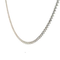 Add some sparkle to your look with this diamond necklace. Crafted from 14 karat white gold, this piece features 114 round brilliant cut diamonds totaling 16.60 carats. Each diamond, measuring 3.4 mm, is carefully chosen for its VS2 clarity and H color, ensuring symmetry across the piece. The three-prong basket settings secure the diamonds while allowing their natural beauty to shine. Silver Tennis Necklace With Diamond Accents In Platinum, Silver Platinum Tennis Necklace With Round Shape, Silver Platinum Round Tennis Necklace, Platinum White Diamond Cut Tennis Necklace, White Gold Tennis Necklace With Diamond Cut, Silver Platinum Tennis Necklace, Dazzling Tennis Necklace With Single Cut Diamonds, Dazzling Diamond Tennis Necklace With Prong Setting, Dazzling White Gold Tennis Necklace With Prong Setting