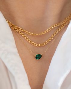 Pear shape Emerald Solitaire necklace in 14k Gold Prettiest green. Wear it alone or layered.•Sold as a pair or as a single stud.•14k solid gold•Emerald measures 7x5mm 0.73-0.75 carat •This lab-created emerald has a chemical make-up identical to the finest emeralds. Luxury Single Strand Emerald Necklace, Luxury Yellow Gold Pear-shaped Emerald Necklace, Teardrop Emerald Yellow Gold Jewelry, Gold Emerald Jewelry With Delicate Chain, Tarnish Resistant Yellow Gold Pear-shaped Jewelry, Tarnish Resistant Pear-shaped Yellow Gold Jewelry, Tarnish-resistant Pear-shaped Yellow Gold Jewelry, Everyday Green Teardrop Pendant Jewelry, Gold Pear-shaped Emerald Necklace Gift