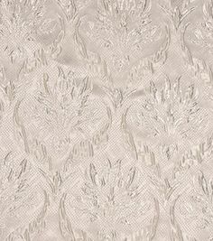 a white wallpaper with an intricate design on the back and bottom half of it