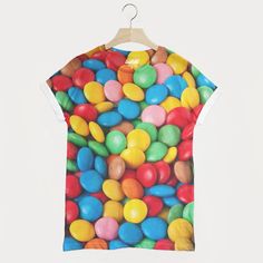 "Pick 'n' mix it up in this tasty t-shirt!  Super-soft unisex t-shirt with giant subli-printed smarties pic. A fun gift for all you fabulous sweet-toothed fashionistas! Buy this for your bro, sister, BFF and makes a cool gift for teenagers. You'll look as sweet as candy-coated chocolate in this brilliant tee - it also makes an easy-peasy candy costume.  View our full range in our Batch1 shop - all of our products are lovingly designed, printed and packed by hand in the UK at Batch1 HQ. Made from Fun Multicolor T-shirt With Sublimation Print, Multicolor Playful T-shirt With Funny Print, Novelty Multicolor Short Sleeve T-shirt, Playful Multicolor Printed T-shirt, Playful Multicolor Sublimation Print T-shirt, Multicolor Graphic Tee T-shirt As Gift, Funny Multicolor Custom Print T-shirt, Fun Multicolor T-shirt As A Gift, Fun Multicolor T-shirt For Gift