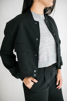 Our Nina jacket is a classic little black jacket that will never go out of style. So easy to layer and style with everything! Size Chart Features: snap closure front pockets ribbed neckline, hem & cuffs fabric content: 100% polyester model is wearing a small. Height 5'6", Bust 34", Waist 27", Hip 37" Ribbed Neckline, Black Jacket, Go Out, Out Of Style, Snap Closure, Going Out, Size Chart, Fabric, How To Wear