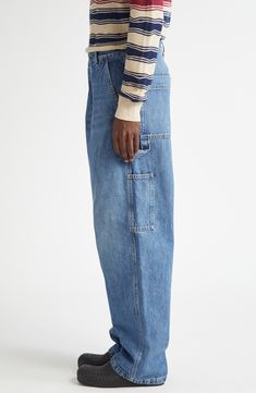 The Milanese label blends carpenter and cargo aesthetics in retro indigo-washed jeans boasting the baggy silhouette seen all over the 2024 runways. 31" inseam; 9" leg opening; 13" front rise; 15" back rise (size 48eu) Zip fly with button closure Front slant pockets; back patch pockets; cargo patch pockets 100% cotton Dry clean Made in Italy Designer Clothing Utility Cargo Jeans With Belt Loops In Medium Wash, Medium Wash Cargo Jeans With Side Pockets, Medium Wash Recycled Denim Cargo Jeans With Five Pockets, Medium Wash Rigid Denim Cargo Pants With Five Pockets, Medium Wash Rigid Denim Cargo Pants, Recycled Denim Medium Wash Cargo Jeans, Medium Wash Recycled Denim Cargo Jeans, Utility Washed Blue Cargo Jeans With Five Pockets, Utility Rigid Denim Cargo Jeans With Five Pockets