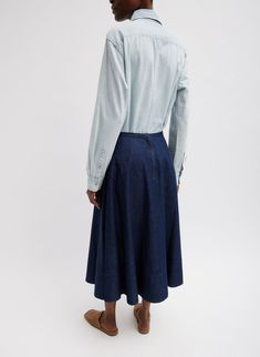 Who doesn’t love a classic circle skirt? All our CP’s will appreciate the Summer Denim Circle Skirt. Crafted from 100% light weight denim from Japan, the Circle Skirt is the perfect PDW to add into your rotation this season. Featuring a zipper and snap detail at the back for closure, this versatile skirt will take you from the office to dinner with ease. Pair back to the matching Cropped Square Neck Top for a set or switch it up and pair back to the Eco Poplin Cropped Shirt and a Berneice Sandal Classic Blue Denim Summer Skirt, Classic Blue Denim Skirt For Summer, Long Cotton Denim Skirt For Work, Elegant Cotton Denim Skirt For Spring, Classic Cotton Denim Skirt For Spring, Classic Blue Denim Skirt For Spring, Classic Full Skirt Cotton Bottoms, Classic Fitted Denim Blue Skirt, Cold Fits