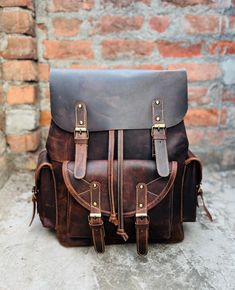 Labor Day  Special offer Flat 70% Off With Free Shipping  ✍✍Free Personalization  Free Gift Wrapping Free Shipping 🔰 FEATURES: ◾ Unisex Backpack ◾ Made in Full-grain Leather, Excellent Quality ◾ Brown Vintage Color ◾ Padded pocket for laptop in the main compartment ◾ Antique Brass Hardware ◾ YKK Zippers ◾ 2 Pen Holder Slot ◾ Phone Holder and card Holder Slot ◾ Interior Zipper Pocket  ◾ Cotton Lining 🔦Material: Cowhide Genuine Leather 🔦Style: British Style, Gentry 🔦Capacity: Can hold a 14inch Leather Backpack For Men, Color Pad, Laptop Travel, Unisex Backpack, College Backpack, Leather Laptop Bag, Antique Brass Hardware, Vintage Color, Leather Laptop