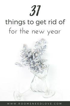 a glass vase filled with lots of crystal stones and the words 31 things to get rid of for the new year