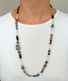 This Handmade Ethnic Necklace is a very unique beaded jewelry, which is going to be yours if you are here.  Its ethnicity and elegance comes from the traditional tribal ethnic design and boho minimalist string structure. It is designed and produced by local shaman artisans. Shamanism is known as a nature worship belief. Shamans bound their soul with nature. Our necklace is designed and is became alive with this bound. If you would like a distinctive, unique, ethnic and dainty necklace, Zoho Accessories is your right place to be ! It's a great necklace for yourself or as a gift for a beloved person on Mother's Day, as a Birthday gift, Christmas gift, and all other special days! Necklace length: 30 Inches (Adjustable length) If you have any questions, write me anytime and I happily to answer Nature Worship, Unique Beaded Jewelry, Tibetan Jewelry, Boho Minimalist, Ethnic Necklaces, Ethnic Design, Ethnic Jewelry, Dainty Necklace, Boho Necklace