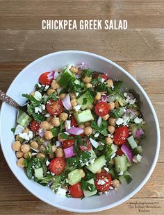 chickpea greek salad in a white bowl