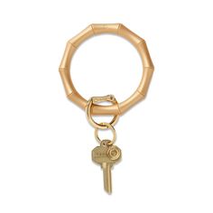 a gold keychain with a metal ring and a small lock on it's end