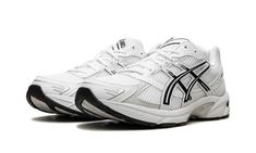 The ASICS Gel-1130 “Black/White” is another standout colorway of the retro performance running shoe.  The ASICS Gel-1130 was first released in 2008 and is now one of the most popular sneakers in the Y2K trend in sneaker culture.  On this colorway, the upper features a white mesh construction with tonal and light grey leather overlays.  ASICS’s classic tiger stripes are designed in white and accented in black  on either side of the shoe.  “ASICS” and “Gel-1130” branding are seen on the mesh tongue.  A techy-looking midsole with the brand’s signature Gel cushioning technology provides a comfortable ride.  Release date: January 1, 2024 Asics 1130, Jordan Golf, Black White Shoes, Nike X Travis Scott, Sneaker Culture, Popular Sneakers, Black And White Shoes, Jordans Women, Kids Converse