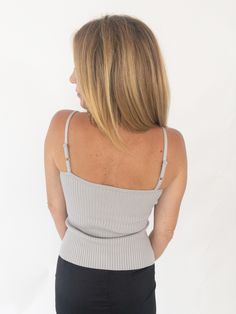 When you want a no fuss top that's a step up from your average tank, reach for the Evening Calm Ribbed Cami. A ribbed knit tank with adjustable straps and fitted silhouette that has plenty of gve in the body. An easy top to dress up or down, with a midi skirt or your favorite jeans, worn alone or layered. 80% Rayon 20% Nylon Model is wearing a size small and is 5’5”, 135 lbs and a B cup. Fits true to size. 135 Lbs, B Cup, Knit Tank, Fitted Silhouette, Knit Tanks, Favorite Jeans, Step Up, Ribbed Knit, Midi Skirt