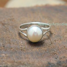 Pearl Ring, Natural Gemstone Ring, Handmade Band Ring, 925 Sterling Silver Ring, Gift For Her, Love Ring, Birthstone Ring, Anniversary Ring About Product:- Gross weight: 3.50 grams according ring size Ring Height & Width: 7x7 mm approx. Band Thickness: 3mm Approx. Gemstone Used: Pearl Metal Used: Solid 925 Sterling Silver Stamp Mark: 925 Metal Color: Shiny Silver Listing is For One (1) Piece Ring. These items are handmade. Jewelry Related: 925 Silver Ring, Middle Finger Ring, Sterling Silver White Round Stone Ring As A Gift, Sterling Silver Pearl Ring For Anniversary, White Gemstone Stackable Rings With Round Band, Adjustable Pearl Ring With Gemstone For Anniversary, White Gemstone Stackable Rings, White Pearl Ring With Simple Design For Anniversary, Anniversary Sterling Silver Pearl Ring With Round Band, Hallmarked Sterling Silver Pearl Ring For Anniversary, Simple Oval Silver Jewelry