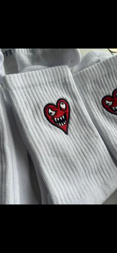 A cute embroidered pair of socks of your choice!, Great gift/Birthday/Valentines/Anniversary - Add initials/names to make it more personal! As soon as your order is processed we will begin to embroider your socks in our studio. This is for TWO embroidery placements, one on each sock. Embroidery Thread:Satin (NEXT DAY DELIVERY ON REQUEST) OR you can create your own custom design! please click on the link to the listing below and follow the instructions in the description: https://www.etsy.com/uk/listing/1018741507/custom-embroidered-logoimage-unisex-t?ref=shop_home_active_1&frs=1 Check out all our other custom designs: https://www.etsy.com/uk/shop/mimiembroiderystudio?ref=search_shop_redirect Customizable White Socks As Gift, Customizable White Socks For Gifts, Customizable White Socks For Gift, White Cotton Socks For Gifts, White Cotton Socks As Gift, White Cotton Socks As A Gift, Sock Embroidery, Socks Logo, Embroidered Socks