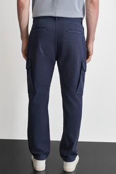 Relaxed fit Cargo Pocket Zipper Closure 100% Cotton Machine wash Origin: Imported Style: M1440057 | DKNY Men's Cargo Pants in Blue Size 3130 Mid-rise Washed Blue Pants With Side Pockets, Blue Utility Jeans With Welt Pockets, Washed Blue Straight Leg Pants With Side Pockets, Navy Bottoms With Pockets And Straight Hem, Washed Blue Straight Leg Cargo Pants, Denim Blue Tapered Leg Cargo Pants, Washed Blue Straight Leg Pants With Patch Pockets, Denim Blue Cargo Pants With Tapered Leg And Pockets, Washed Blue Utility Pants With Hip Pockets