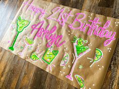 a brown paper bag with happy 21st birthday images on it