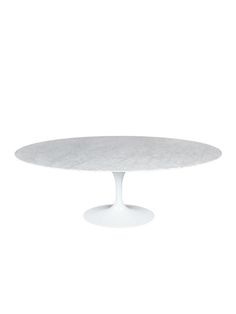 an oval white table with a marble top on a plain surface, viewed from the front