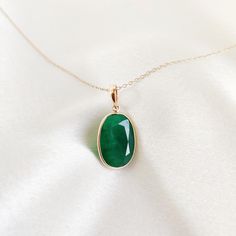 This stunning pendant is set in 14k Solid Yellow Gold with Natural Emerald with utmost precision. It is an unique gemstone pendant for nearly every occasion and is completely hassle-free jewelry. 🔷ABOUT GEMSTONE:  Emerald is often associated with love and romantic relationships. It is believed to promote love, loyalty, and unity, making it a popular choice for engagement and anniversary jewelry. Emerald is often associated with abundance and financial success. It is believed to attract prosperi Oval May Birthstone Jewelry With Polished Finish, Oval May Birthstone Gemstone Necklace, Classic Oval Emerald Necklace For Gift, Emerald Oval Pendant Necklace For Anniversary, Faceted Oval Necklaces For Anniversary, Elegant Oval Gemstones For Gifts, Oval Gemstone Necklace In 14k Gold, 14k Gold Oval Jewelry For May Birthstone, Elegant Oval Emerald Necklace As Gift