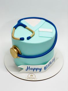 a birthday cake with a stethoscope on top