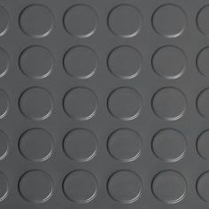 an image of a metal surface with circles on it