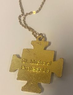 You are purchasing a very nice either gold tone or & silver tone medium size cross of Saint Michael the Archangel. Approximate size: 1.5" x 1.5" Chain is 18" in length flat cable chain. Comes in an acrylic box, ready to be given as a gift or for safe keeping. Please see pictures for details. Carry this cross with you as a reminder that Saint Michael the Archangel is the defender of evil, and with his intercession we can keep evil away. ********************************************************** I Saint Michael The Archangel, Family Mission, Michael The Archangel, Cross Gold, Iron Cross, Saint Michael, Acrylic Box, St Michael, Cable Chain