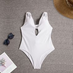 Embrace elegance and allure with our Sleek Backless Monochrome One-Piece Swimsuit. Crafted with a minimalist design and a daring backless silhouette, this swimsuit exudes sophistication and confidence. The smooth, high-quality fabric offers a comfortable fit, while the flattering cut enhances your curves. Whether lounging by the pool or strolling along the beach, make a statement with this chic swimwear essentialWhether with steel tow: With chest pad without steel towColor: WhiteSize: S, M, LSty Solid Backless One-piece Swimsuit, Summer Backless One Piece With Lined Body, Summer Backless One-piece With Lined Body, One-piece Bodysuit For Sunbathing, White Low Back Swimwear For Swimming, Summer Backless Bodysuit For Pool, Solid Color Low Back Bodysuit For Pool, Summer Backless One Pieces For Sunbathing, Solid Backless Bodysuit For Swimming