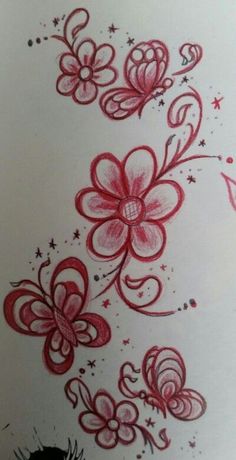 a drawing of flowers with stars and swirls on the side of a sheet of paper