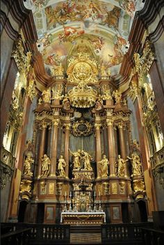 an ornately decorated church with gold decorations