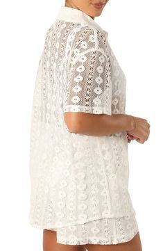 Intricate lace and an oversized fit lends summery charm to this sheer short-sleeve button-up. Front button closure Spread collar Short sleeves Sheer 100% cotton Hand wash, dry flat Imported Delicate Lace Short Sleeve Top For Summer, Short Sleeve Delicate Lace Tops For Summer, Feminine Scalloped Lace Top For Summer, Delicate Lace Short Sleeve Summer Tops, Spring Scallop Lace Top For Daywear, Spring Scalloped Lace Top For Daywear, White Short Sleeve Lace Top With Scalloped Lace, Scalloped Lace Top For Spring Daywear, White Scalloped Lace Short Sleeve Top