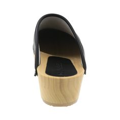 "The Maja is a hand-made open back, classic wooden clog sandal in genuine leather. * Hand-made in Europe * Genuine leather * 2\" heel * Wood outsole with rocker bottom to propel foot forward ---> Ships in 1 business day Sizing tip: This clog is based on the German Fussform shape, so the toe area is bigger and wider overall. If you have a narrow to a narrow/medium width foot, then it is recommended to go down one size. EU US Women's EU 36 ---- US 5.5 - 6 EU 37 ---- US 6.5 EU 38 ---- US 7 - 7.5 Swedish Clogs, Best Walking Shoes, Wooden Clogs, Clog Sandals, Leather Clogs, Dark Brown Leather, Casual Sweaters, Styles Fashion, Mule Clogs