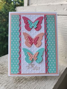 a handmade birthday card with butterflies on it