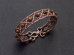 Elegant Brown Copper Wire Jewelry, Bronze Wire Wrapped Copper Bracelets, Unique Brown Wire Wrapped Bracelets, Copper Wire Wrapped Bangle, Brown Copper Wire Wrapped Bracelets, Elegant Copper Wire Wrapped Bracelets, Elegant Copper Wire Bangle Bracelets, Copper Wire Crafts, Copper Wire Art