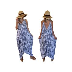 Our most versatile dress that will fit sizes small and up to 2X, it does not come in sizes. This stunning dress has a unique tropical Hawaiian design with  an asymmetrical high-low hem and pockets. Made from 100% super soft rayon fabric, this dress is great for any occasion. Measurements: 28 inches from armpit to armpit with garment lying flat (please double for circumference) 38 inches width at hip with garment lying flat (please double for circumference) 39 inches length frontside 44 inches length backside 29 inches V to middle frontside For reference, the model in the photo is 5 feet 2 inches. Feel free to contact us with any additional measurement questions you have or concerns. Casual Sleeveless Dresses With Palm Tree Print, Casual Tropical Print Maxi Dress For Beach, Summer Sleeveless Dresses With Leaf Print, Summer Sleeveless Dress With Leaf Print, Beach Dresses With Leaf Print And Sleeveless Design, Beachwear Sleeveless Dress With Palm Tree Print, Tropical V-neck Sundress With Tropical Print, Casual V-neck Sundress With Tropical Print, Sleeveless Leaf Print Beach Dress