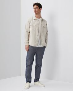 The Garment Dyed Twill Overshirt comes in a minimal, straight-fitting silhouette detailed with a spread collar, buttoned flap pockets, a shirttail hem and a back yoke with a box pleat. The Garment Dyed Twill Overshirt is styled with the Chad Linen Tee and the Stretch Canvas Traveler Pant. Casual Shirt With Pockets And Shirttail Hem, Casual Shirttail Hem Shirt With Pockets, Linen Shirt With Pockets And Shirttail Hem, Business Casual Shirt With Spread Collar And Patch Pockets, Relaxed Fit Shirt With Buttoned Pockets And Spread Collar, Relaxed Fit Shirt With Flap Pockets For Spring, Casual Linen Shirt With Flap Pockets, Casual Linen Shirt With Shirttail Hem, Relaxed Fit Shirt With Concealed Placket And Spread Collar