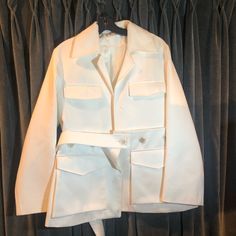 Brand New Never Worn Missing Buttons Designer White Blazer For Fall, Modern White Blazer For Spring, Designer White Blazer For Spring, White Designer Blazer For Spring, Designer White Outerwear For Work, Modern White Outerwear For Spring, Modern White Spring Outerwear, Designer White Spring Blazer, Acrylic Outerwear With Button Closure