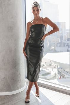 That is the exact baddie vibe we are getting from this leather dress!! Comes in black or tan. Strapless maxi laether dress, slit in the back, zipper closure in the back, dress is lined Material is Polyester Hang to dry Model Cristen is 5'9 wearing a small SHOP THE LOOK Small Medium Large Length 62" 63" 64" Bust 14" 15" 16" Strapless Leather Dress Outfit, Strapless Leather Dress, Leather Tube Dress, Wedding Guest Romper, Leather Dress Outfit, Party Bottoms, Birthday Fits, Black Leather Dresses, Amazing Lace