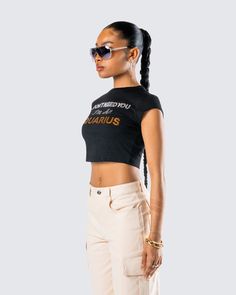 We love an independent baddie 💅 Let them know the vibes in this black top made from stretch jersey fabric and complete with a rhinestone “I Don't Need You I’m An Aquarius” graphic ✨🖤 Y2k Tops With Letter Print For Night Out, Y2k Letter Print Tops For Night Out, Y2k Style Tops With Letter Print For Night Out, Black Rebellious Streetwear Tops, Rebellious Black Crew Neck Top, Y2k Black T-shirt For Night Out, Rebellious Fitted Graphic Print Tops, Rebellious Black Crew Neck T-shirt, Black Graphic Tee Crop Top With Slogan