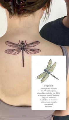 a woman with a dragonfly tattoo on her back shoulder and the words dragonfly written below it