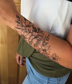 a woman's arm with flowers on it and the words, toutees les publications